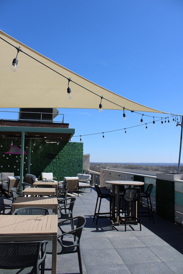 furniture, chair, outdoor table, outdoor furniture, restaurant, shade