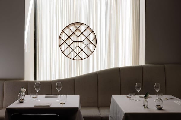 furniture, table, tablecloth, restaurant, light fixture, linens