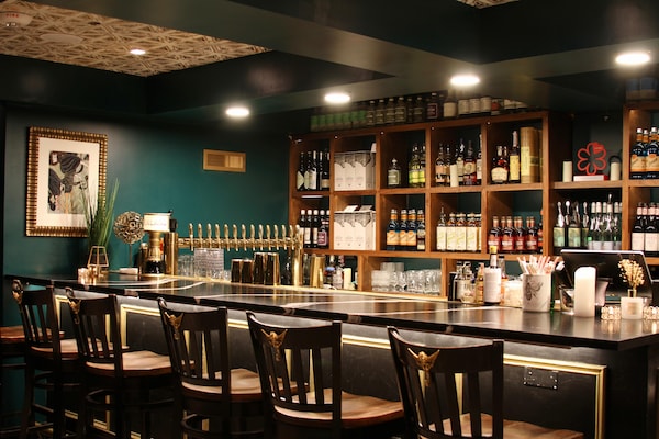 bottle, barware, bar, furniture, drinking establishment, alcoholic drink
