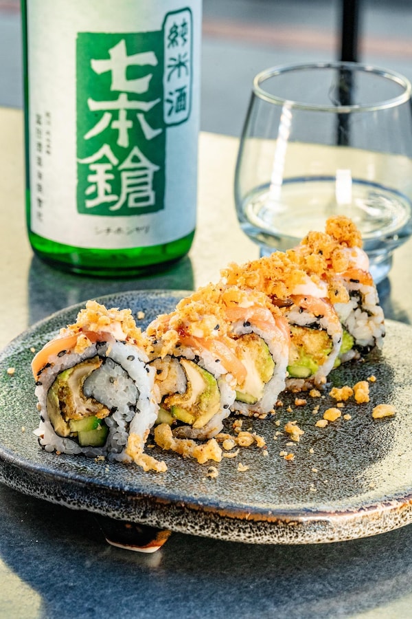 food, bottle, ingredient, sushi, alcoholic drink, california roll